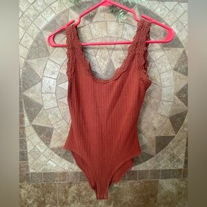 Rust Ribbed Body Suit